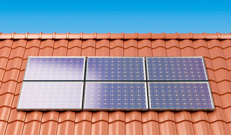 Solar panels on tiled roof after roof restoration completed